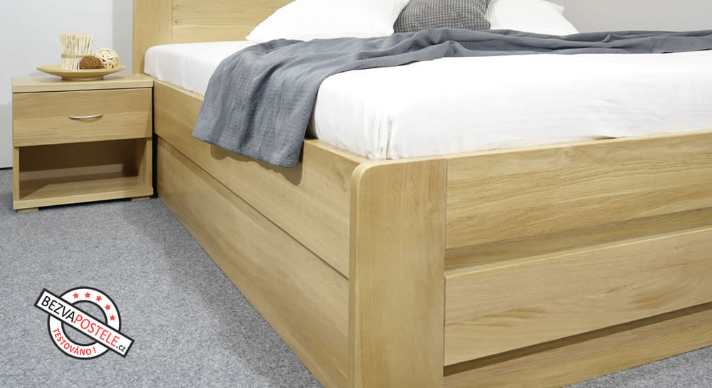 Detail boku postele s úložným prostorem Justina z masivu dubu