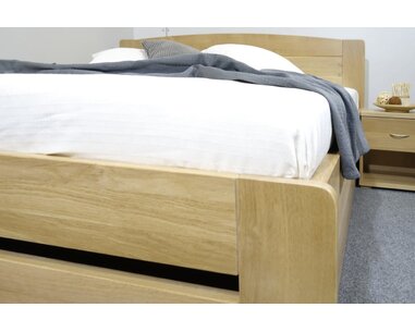 Dřevěná postel jednolůžko Justina, masiv dub,140x200