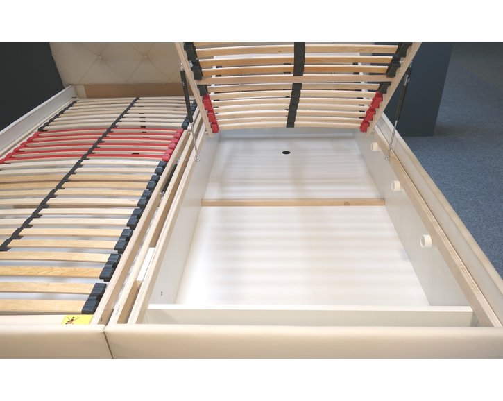 Zvýšená čalouněná postel s úložným prostorem Jolanda
