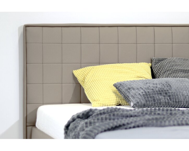 Čalouněná postel s úložným prostorem Belarona, 140x200